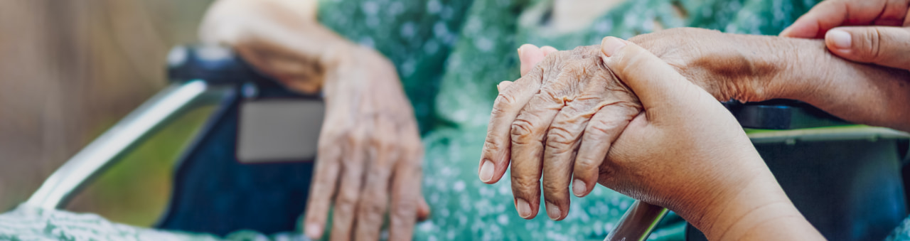 Avamere Nurse Holding Elderly Patients Hands Mobile